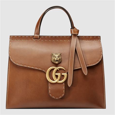 gucci top handle bag.